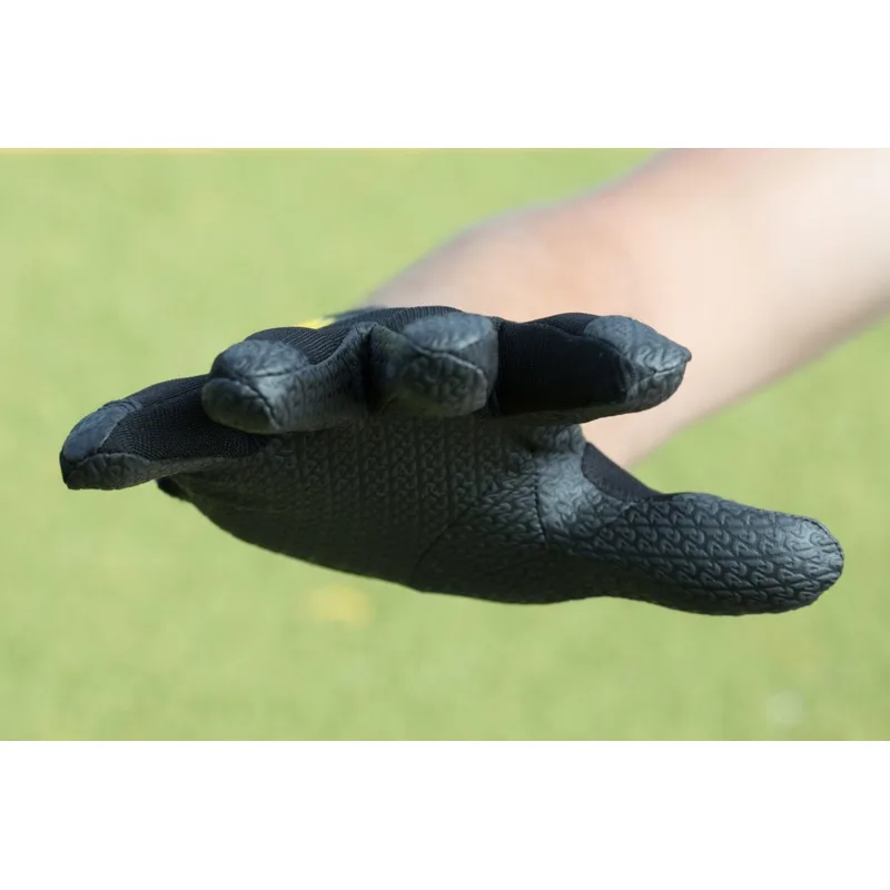 Friction disc golf glove palm-up, showing the rubberized grip pattern on the palm and fingers